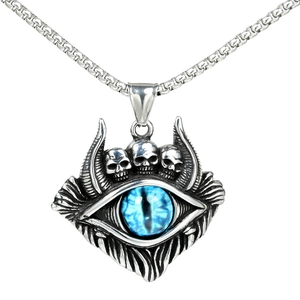 Detailed macro of vintage Gothic skull pendant necklace with a blue evil eye stone