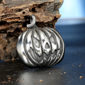Titanium steel pumpkin pendant for Halloween with Jack-o'-lantern carved face design