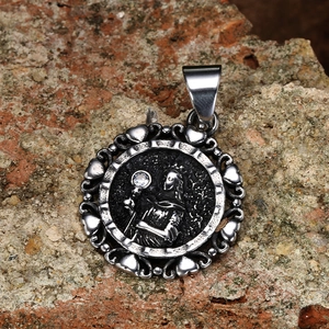Vintage steel skull pendant with religious saint relief and zircon on stone