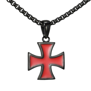 Close-up of retro punk cross pendant with black steel finish and red oil dripping details