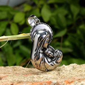 Pendentif religieux vintage en argent avec la Vierge Marie et Jésus sur socle en pierre