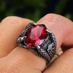 Gothic punk dragon claw ring with large oval red gemstone in vintage silver finish