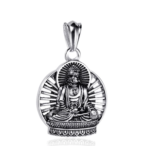 Vintage silver Buddha pendant featuring a lotus base and radial light backdrop