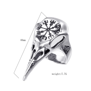 Detail of Viking raven skull ring with Vegvisir compass engraving and antique silver finish
