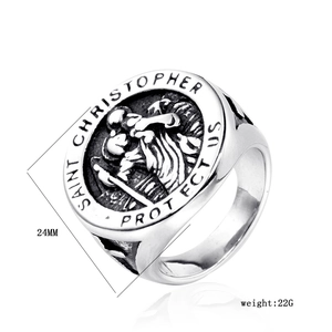 Macro view of Saint Christopher medal ring with engraved protect us text and 24mm dimension