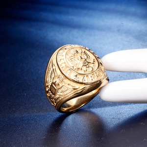 Macro shot of gold stainless steel United States Army eagle signet ring detail