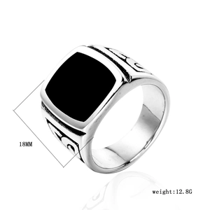 Detail of vintage men's silver ring with black enamel inlay and 18mm front width