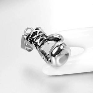 Polished silver boxing glove pendant detail featuring vintage black oxidation textures