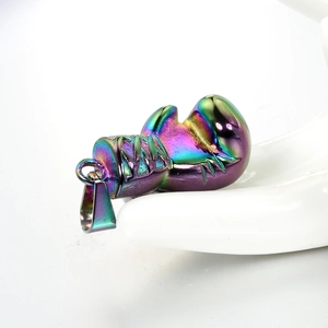 Macro detail of boxing glove pendant with colorful iridescent electroplating finish