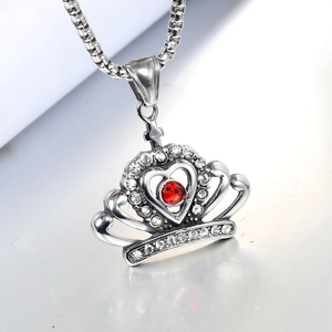 Regal stainless steel crown pendant with red gemstone heart and sparkling zircons