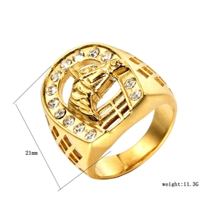 Detailed view of 21mm gold horseshoe ring with horse head relief and inlaid rhinestones