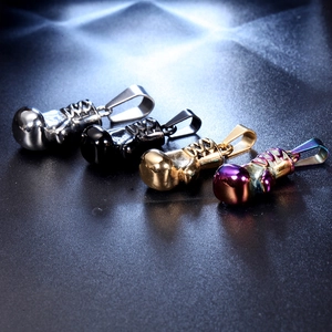 Polished boxing glove pendants in silver, black, gold and iridescent gradient steel