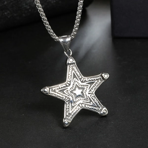Retro punk star pendant necklace in stainless steel with detailed etched wave textures