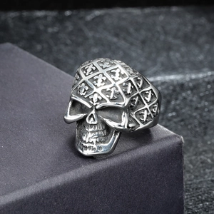 Vintage stainless steel skull ring with fleur-de-lis engraving in gothic punk style