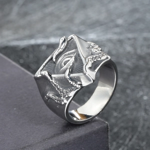 Military style titanium steel ring with Eye of Providence and octopus tentacle relief