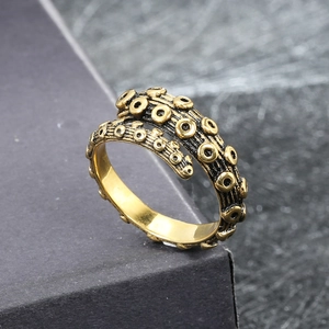 Vintage octopus tentacle open ring in antique brass finish with retro 3D suction cup details