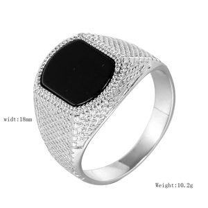 Detail view of silver stainless steel ring with black signet face, 18mm width and 10.2g weight