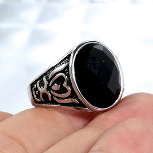 Men's vintage silver ring with faceted black onyx stone and retro embossed texture