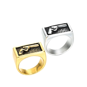 Vintage stainless steel signet rings for men with black honeycomb pattern and embossed gun