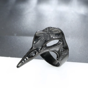 Detail of a black punk raven skull ring featuring an engraved Nordic Vegvisir compass