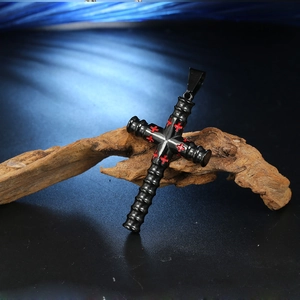 Men's black stainless steel cross pendant with red patterns on vintage wood base