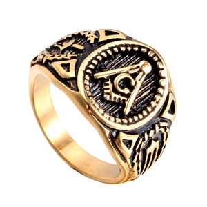 Macro view of Masonic Freemason ring with gold finish and vintage engraved G symbol