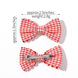 Cute red and white checkered bow hair clips for girls with scalloped edges and metal clip