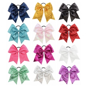 Set of 12 vibrant 8-inch sequin bow hair ties in multiple colors for girls and children