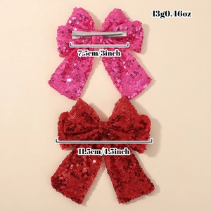 Red and magenta sequin bow hair clips for girls with metal duckbill clips and sizing