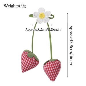 Handmade strawberry fabric charm with red gingham pattern and white daisy flower accessory