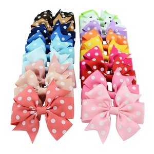 Set of 20 colorful polka dot grosgrain ribbon hair bows for girls in various vibrant shades