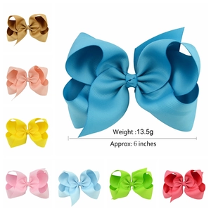 Vue détaillée des pinces à nœud en gros-grain de 15 cm avec diverses options de couleurs