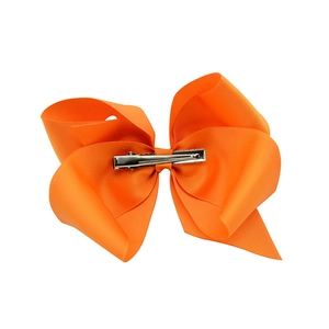 Grosse pince à cheveux avec nœud en ruban gros-grain orange et attache en métal