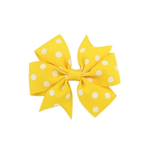 Yellow polka dot grosgrain ribbon hair bow clip for kids with a classic double layer design
