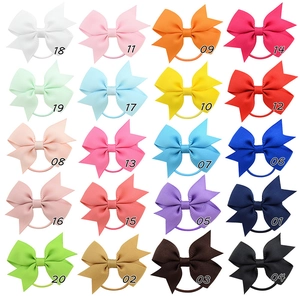 Détail de 20 élastiques à cheveux avec nœud en ruban gros-grain coloré pour petites filles