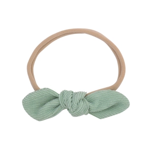 Green corduroy bow baby headband with high-elastic seamless nude nylon strap
