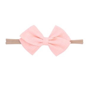 Pink cotton bow baby headband with soft nylon elastic strap for newborns and infants