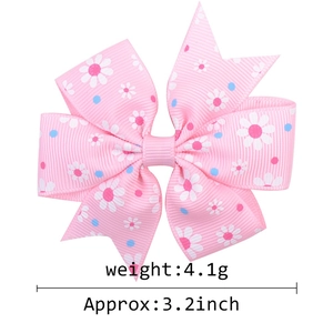 Pink 3.2 inch grosgrain ribbon hair bow for girls with white daisy flower patterns