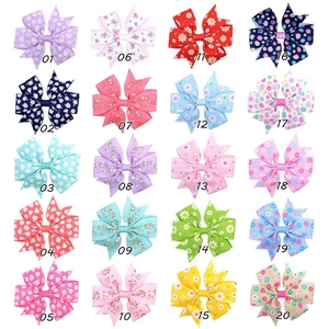 Grid showing twenty different floral ribbon bow hair clips for girls in macaron colors
