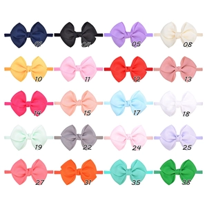 Détail de 20 bandeaux pour bébé en nylon avec nœuds en ruban gros-grain de couleurs variées