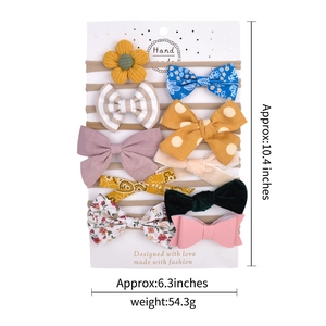 Set of 10 soft nylon baby headbands with colorful floral and polka dot fabric bows