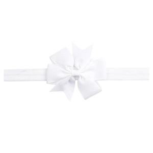 Detail of a white grosgrain ribbon bow on a soft elastic nylon headband for babies