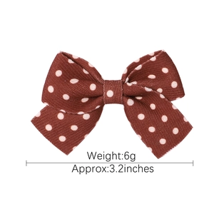 Retro brown polka dot bow hair clip for women, measuring 3.2 inches and weighing 6g