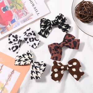 5-piece fabric bow hair clips set with houndstooth leopard and polka dot patterns