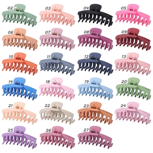 Detailed grid of large matte shark hair claws in twenty-three Morandi color variations