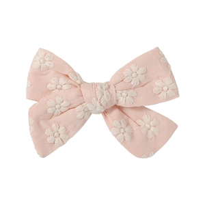 Pink floral bow hair clips with white daisy embroidery for girls in a sweet style