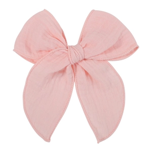 Pink muslin cotton bow hair clip with handcrafted texture for elegant styling