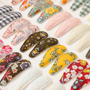 Set of floral and plaid fabric-wrapped snap hair clips for girls with embroidery