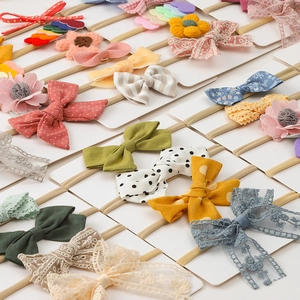 Detailed collection of assorted baby headbands with various bow and lace styles