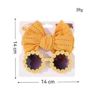 Set aus orangefarbenem Schleifen-Stirnband und Gänseblümchen-Sonnenbrille für Kinder